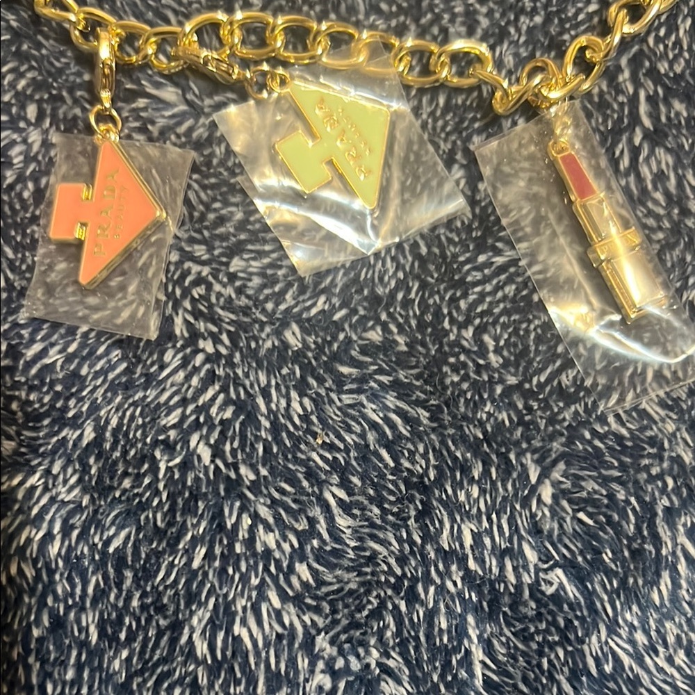 Prada Gold and Red Charm Bracelet